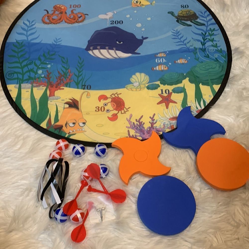 Children’s darts game. Foldable for storage